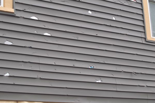 Damaged Siding Replacement in Cypress