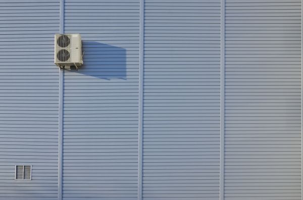 Flat Metal Siding Installation in Cypress